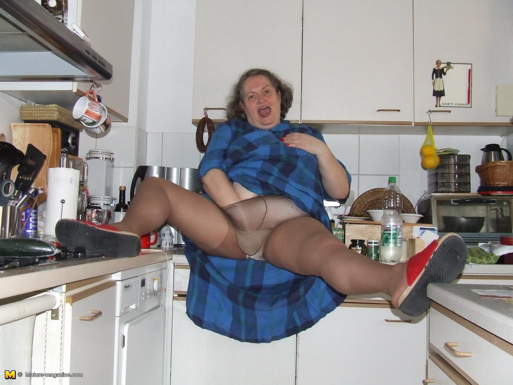 Amateur chubby housewife getting nasty in the kitchen picture