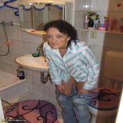 mature slut caught changing clothes in the bathroom