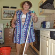 This housewife loves to get naked in the kitchen